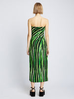 Back full length image of model wearing Painted Stripe Strapless Dress in FATIGUE MULTI