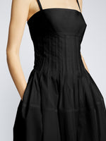 Detail image of model wearing Eco Poplin Pintuck Dress in BLACK