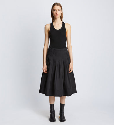 Front image of model in Eco Poplin Wrap Skirt in black
