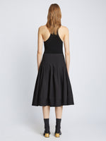 Back image of model in Eco Poplin Wrap Skirt in black
