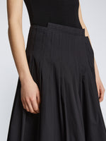 Detail image of model in Eco Poplin Wrap Skirt in black