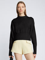 Front cropped image of model wearing Textured Cotton Sweater in BLACK