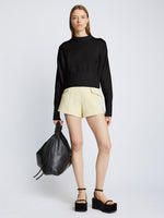 Front full length image of model wearing Textured Cotton Sweater in BLACK