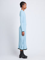 Side full length image of model wearing Silk Cashmere Rib Knit Skirt in LIGHT BLUE