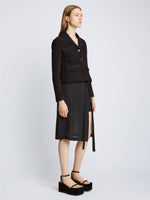 Side full length image of model wearing Bi-Stretch Tweed Jacket in BLACK