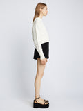 Side full length image of model wearing Viscose Suiting Shorts in BLACK