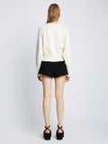 Back full length image of model wearing Viscose Suiting Shorts in BLACK