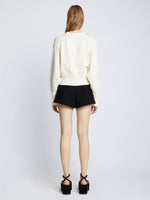 Back full length image of model wearing Viscose Suiting Shorts in BLACK