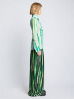 Side full length image of model wearing Painted Stripe Pants in FATIGUE MULTI