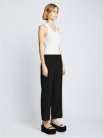 Side full length image of model wearing Bi-Stretch Crepe Cropped Pants in BLACK