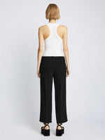 Back full length image of model wearing Bi-Stretch Crepe Cropped Pants in BLACK