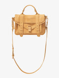 Image of Tonal PS1 Tiny Bag in SAND with strap hanging