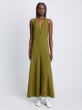 Front full length image of model wearing Matte Crepe Twist Back V-Neck Dress in OLIVE