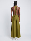 Back full length image of model wearing Matte Crepe Twist Back V-Neck Dress in OLIVE