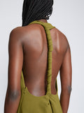 Detail image of model wearing Matte Crepe Twist Back V-Neck Dress in OLIVE