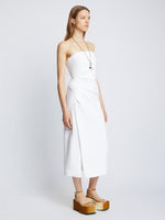 Side full length image of model wearing Compact Terry Jersey Dress in WHITE