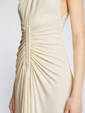 Detail image of model wearing Crepe Jersey Ruched Dress in IVORY