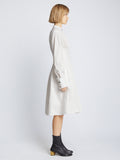 Side full length image of model wearing Eco Poplin Shirt Dress in WHITE