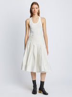 Front image of model in Eco Poplin Wrap Skirt in white