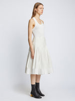 Side image of model in Eco Poplin Wrap Skirt in white