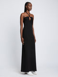 Side full length image of model wearing Textured Cotton Knit Halter Dress in BLACK