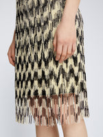 Detail image of model wearing Graphic Beaded Fringe Embroidered Skirt in BLACK MULTI