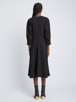 Back full length image of model wearing Matte Viscose Crepe Dress in BLACK