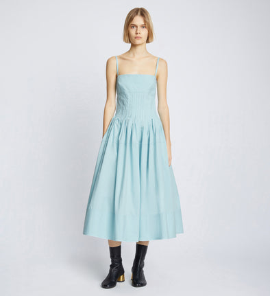 Front full length image of model wearing Eco Poplin Pintuck Dress in BABY BLUE