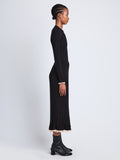 Side full length image of model wearing Silk Cashmere Rib Knit Skirt in BLACK