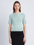 Front cropped image of model wearing Ribbon Crochet Fringe Top in PALE BLUE