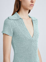 Detail image of model wearing Ribbon Crochet Fringe Dress in PALE BLUE