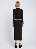 Back full length image of model wearing Silk Viscose Knit Skirt in BLACK