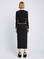 Back full length image of model wearing Silk Viscose Knit Skirt in BLACK