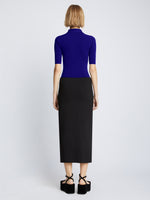 Back full length image of model wearing Silk Viscose Polo Bodysuit in COBALT