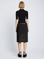 Back full length image of model wearing Silk Viscose Polo Bodysuit in BLACK