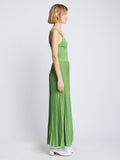 Side full length image of model wearing Metallic Knit Dress in GREEN