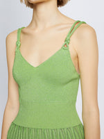 Detail image of model wearing Metallic Knit Dress in GREEN