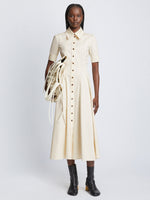 Front full length image of model wearing Silk Cotton Shirt Dress in ECRU