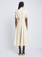 Back full length image of model wearing Silk Cotton Shirt Dress in ECRU