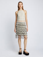 Front full length image of model wearing Graphic Beaded Fringe Embroidered Top in WHITE MULTI