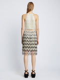 Back full length image of model wearing Graphic Beaded Fringe Embroidered Top in WHITE MULTI