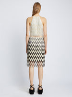 Back full length image of model wearing Graphic Beaded Fringe Embroidered Top in WHITE MULTI