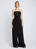 Front image of model in Matte Viscose Crepe Strapless Top in Black