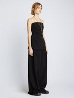 Side image of model in Matte Viscose Crepe Strapless Top in Black