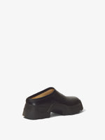 Back 3/4 image of STOMP MULES in Black
