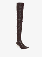 Back 3/4 image of SPIKE STRETCH OVER-THE-KNEE BOOTS in Black with leather wrinkled