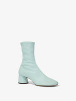 Front 3/4 image of GLOVE STRETCH ANKLE BOOTS in Turquoise/Aqua