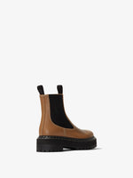 Back 3/4 image of LUG SOLE PLATFORM CHELSEA BOOTS in Dark Beige