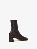 Back 3/4 image of GLOVE STRETCH ANKLE BOOTS in Black