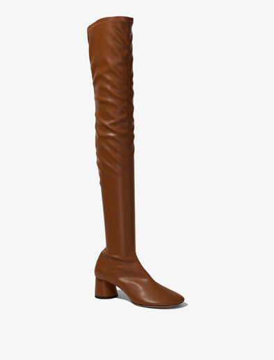 Front 3/4 image of GLOVE STRETCH OVER-THE-KNEE BOOTS in Medium Orange